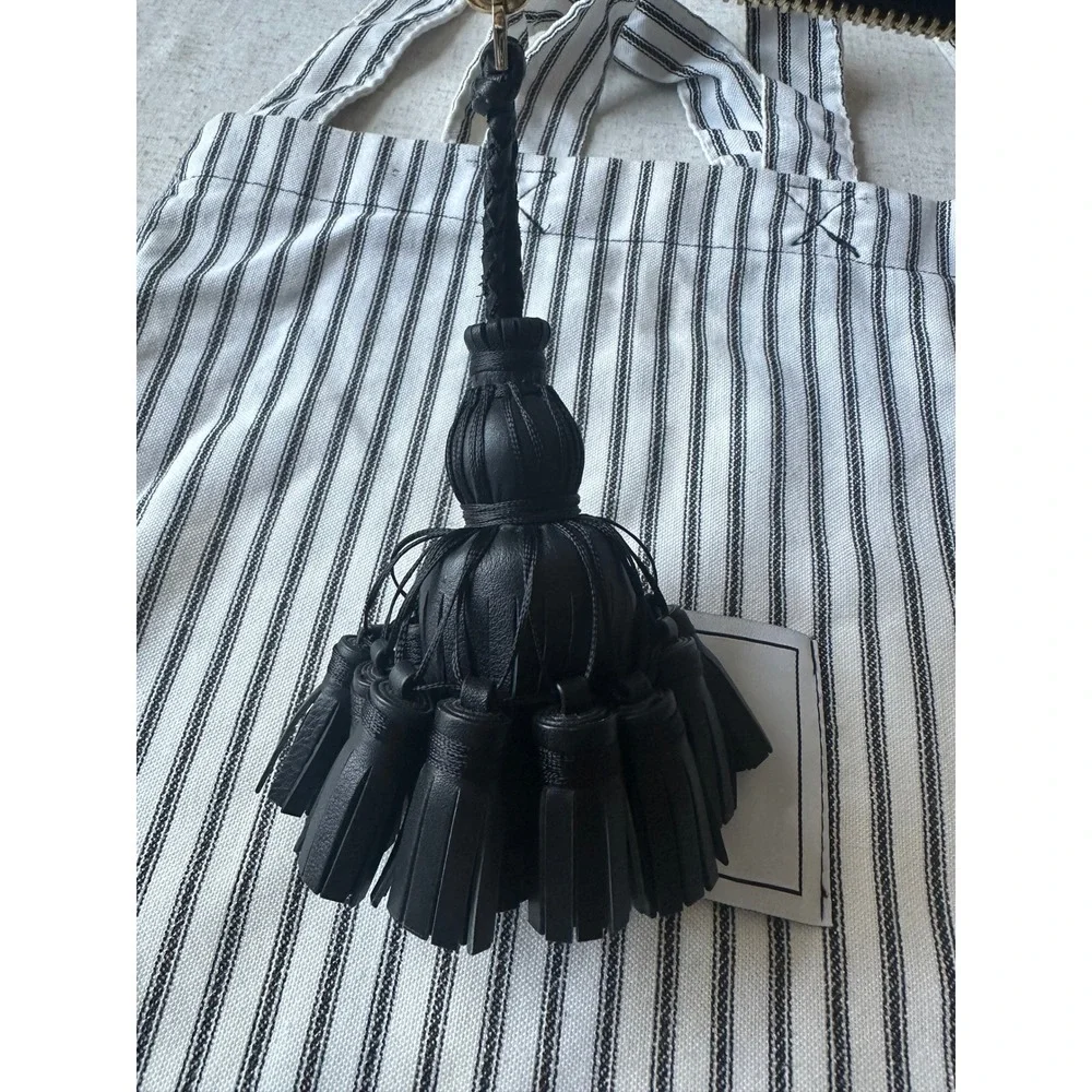 Anya Hindmarch Georgiana All Over Wink Sticker Clutch Bag with Tassel